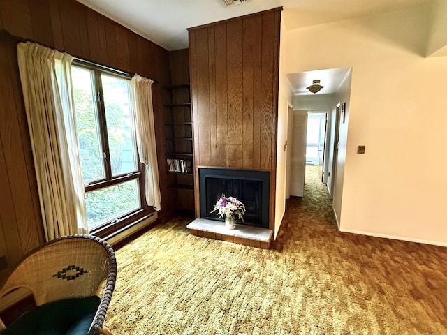 170 E Holly Ln Unit 170, Little Egg Harbor, NJ 08087 - carpeted living room with healthy amount of natural light, a fireplace, built in features, and wooden walls
