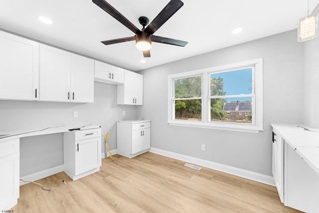 243 Wintergreen Ln, Penns Grove Borough, NJ 08069 - kitchen featuring a ceiling fan, light wood-type flooring, white cabinets, recessed lighting, and built in study area