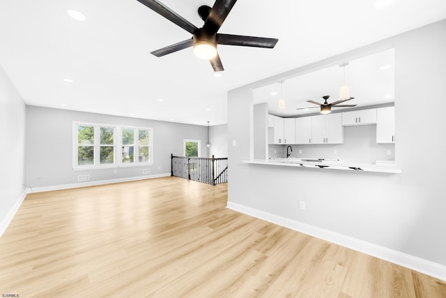 243 Wintergreen Ln, Penns Grove Borough, NJ 08069 - unfurnished living room featuring ceiling fan, light wood finished floors, and recessed lighting