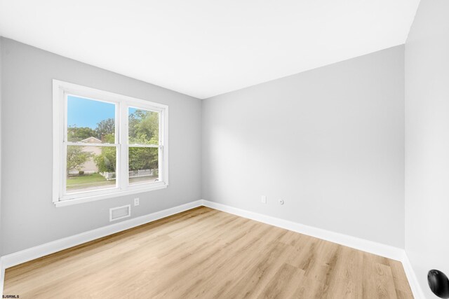 243 Wintergreen Ln, Penns Grove Borough, NJ 08069 - spare room featuring light wood-style flooring and baseboards