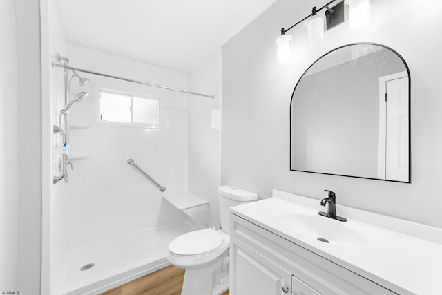 243 Wintergreen Ln, Penns Grove Borough, NJ 08069 - full bath with a shower, vanity, and wood finished floors