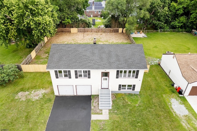 243 Wintergreen Ln, Penns Grove Borough, NJ 08069 - view of front of house with driveway, a garage, and a shingled roof