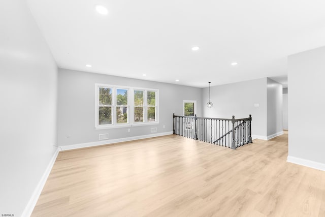 243 Wintergreen Ln, Penns Grove Borough, NJ 08069 - empty room with light wood finished floors and recessed lighting