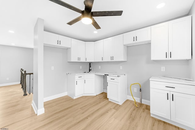 243 Wintergreen Ln, Penns Grove Borough, NJ 08069 - kitchen featuring a ceiling fan, light wood-style floors, recessed lighting, white cabinets, and light countertops