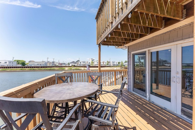 151 N Annapolis Ave Unit D, Atlantic City, NJ 08401 - wooden deck featuring a water view and outdoor dining area