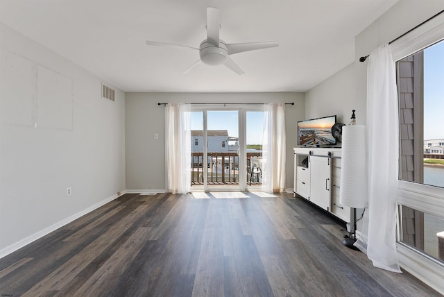 151 N Annapolis Ave Unit D, Atlantic City, NJ 08401 - unfurnished living room featuring dark wood-style flooring and a ceiling fan