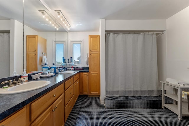 151 N Annapolis Ave Unit D, Atlantic City, NJ 08401 - bathroom with double vanity, curtained shower, and tile patterned flooring