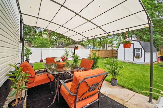 318 Mount Vernon Ave, Northfield, NJ 08225 - fenced backyard featuring a storage shed, outdoor dining area, and a patio