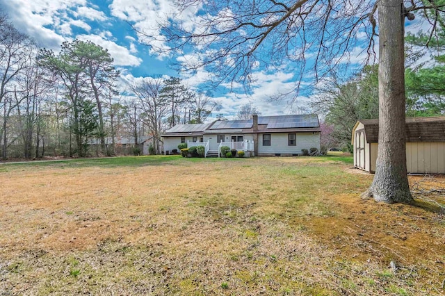 628 1st Ave, Galloway Township, NJ 08205 - view of green lawn featuring a storage unit