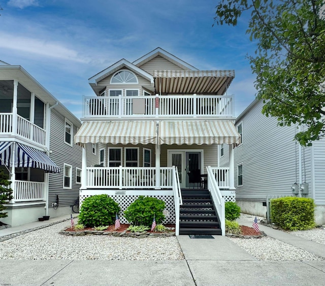 331 Asbury Ave Unit 2, Ocean City, NJ 08226 - view of front of property featuring a balcony and a porch
