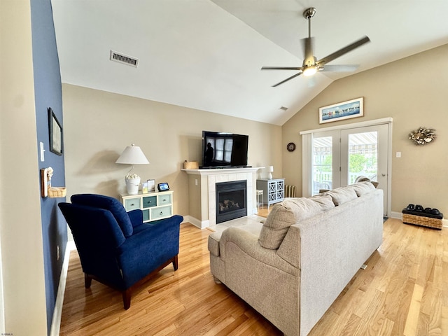 331 Asbury Ave Unit 2, Ocean City, NJ 08226 - living area with ceiling fan, light wood finished floors, a fireplace, and high vaulted ceiling