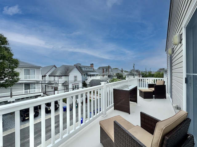 331 Asbury Ave Unit 2, Ocean City, NJ 08226 - balcony with a residential view and outdoor lounge area