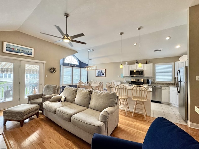 331 Asbury Ave Unit 2, Ocean City, NJ 08226 - living room with lofted ceiling, ceiling fan, light wood-style floors, and healthy amount of natural light