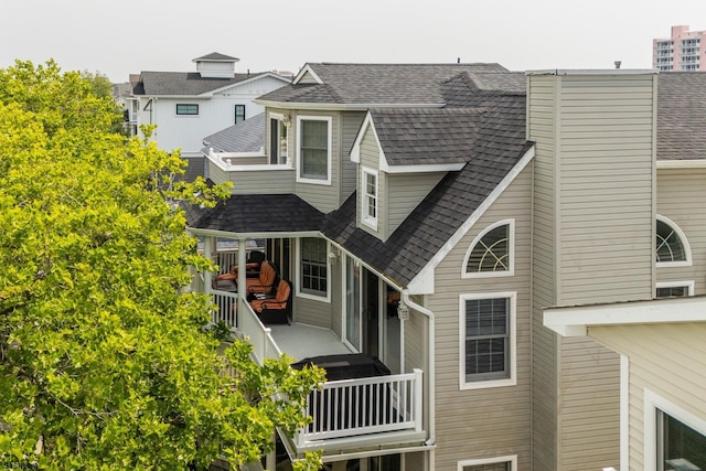 1611 Central Ave Unit 2, Ocean City, NJ 08226 - back of property featuring a shingled roof and a chimney