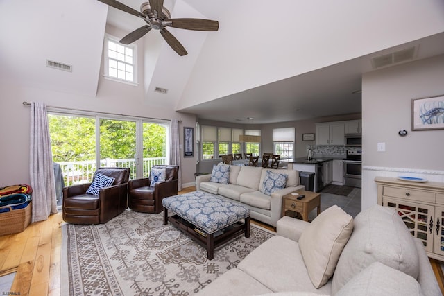 1611 Central Ave Unit 2, Ocean City, NJ 08226 - living room with light wood-style flooring, a high ceiling, and ceiling fan