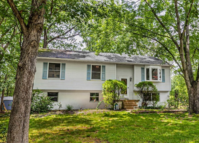 451 9th St, Newtonville, NJ 08346 - raised ranch featuring a front yard and stucco siding