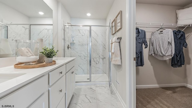 17 N 10th St, Middle Township, NJ 08251 - full bath with double vanity, a marble finish shower, a spacious closet, recessed lighting, and marble finish floors