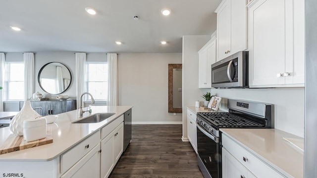 17 N 10th St, Middle Township, NJ 08251 - kitchen with stainless steel appliances, plenty of natural light, dark wood finished floors, light countertops, and recessed lighting