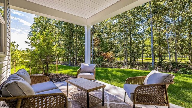 57 Siegtown Rd, Middle Township, NJ 08210 - view of patio with view of wooded area
