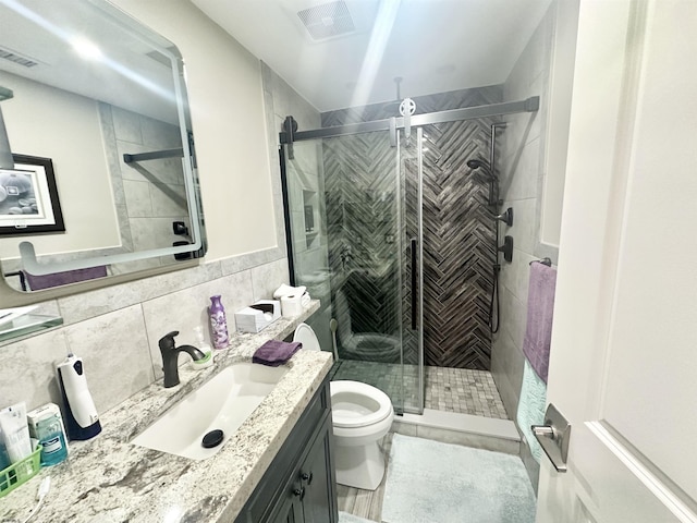 57 Waterview Dr Unit 57, Galloway Township, NJ 08205 - full bathroom featuring vanity, a shower stall, and tile walls