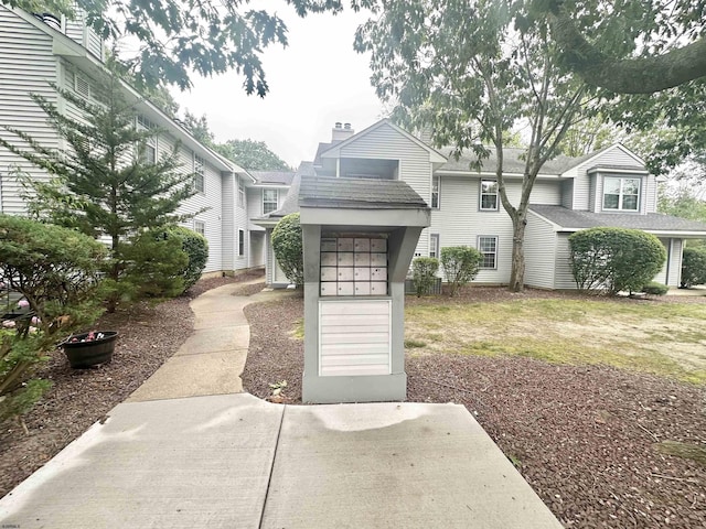 57 Waterview Dr Unit 57, Galloway Township, NJ 08205 - view of front of home featuring roof with shingles and a chimney