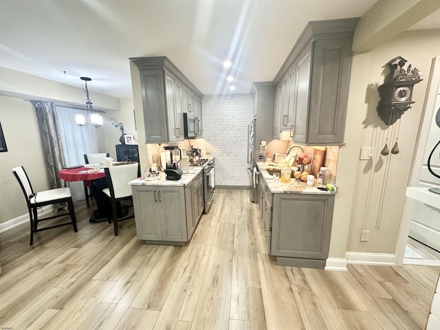 57 Waterview Dr Unit 57, Galloway Township, NJ 08205 - kitchen with gray cabinetry, stainless steel appliances, and light wood finished floors