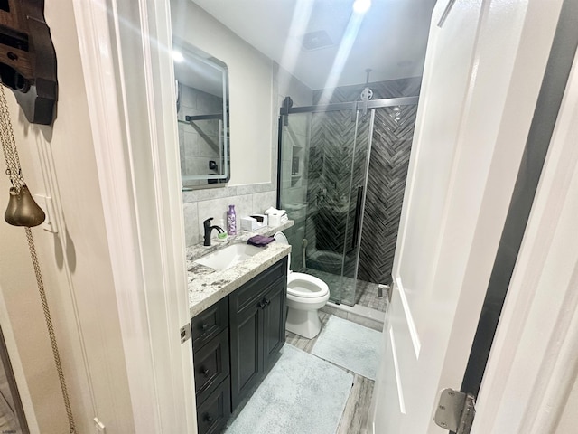 57 Waterview Dr Unit 57, Galloway Township, NJ 08205 - full bathroom featuring tile walls, vanity, a shower stall, and tile patterned floors