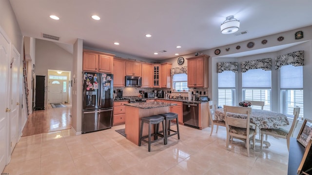 229 Lander Rd, Egg Harbor Township, NJ 08234 - kitchen with stainless steel appliances, a center island, backsplash, a kitchen breakfast bar, and recessed lighting