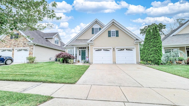 229 Lander Rd, Egg Harbor Township, NJ 08234 - traditional-style home with concrete driveway, a front lawn, and a garage