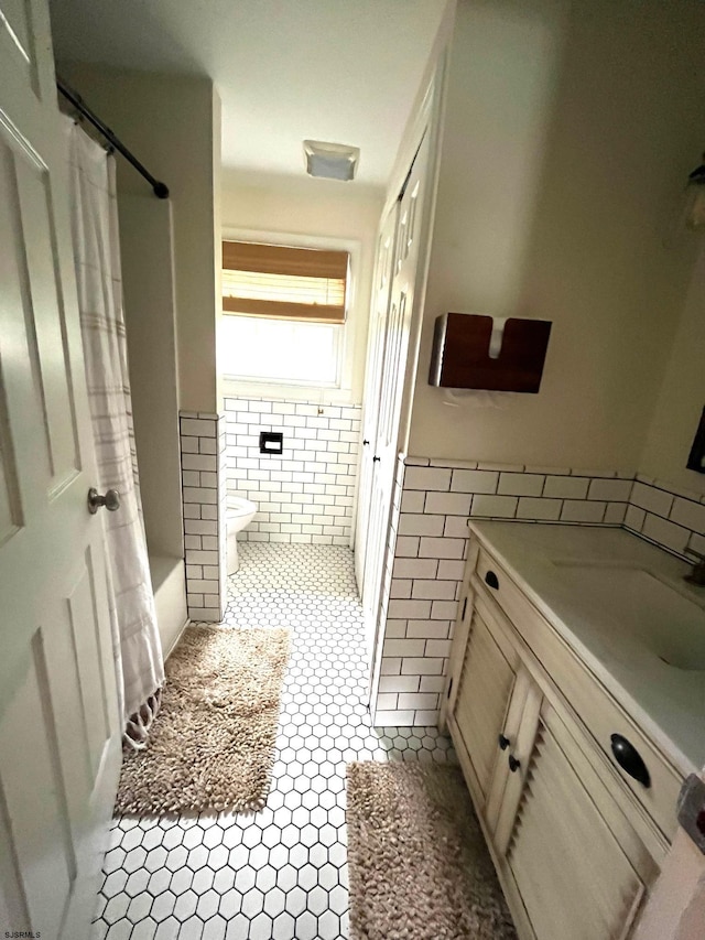 5924 Cedarcroft Dr, Mays Landing, NJ 08330 - full bathroom with tile walls, tile patterned flooring, vanity, shower / bath combo, and wainscoting