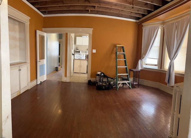 215 N Dorset, Ventnor Heights, NJ 08406 - misc room with wood finished floors, radiator, and arched walkways