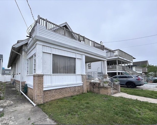 215 N Dorset, Ventnor Heights, NJ 08406 - view of front of house with a balcony and a front yard