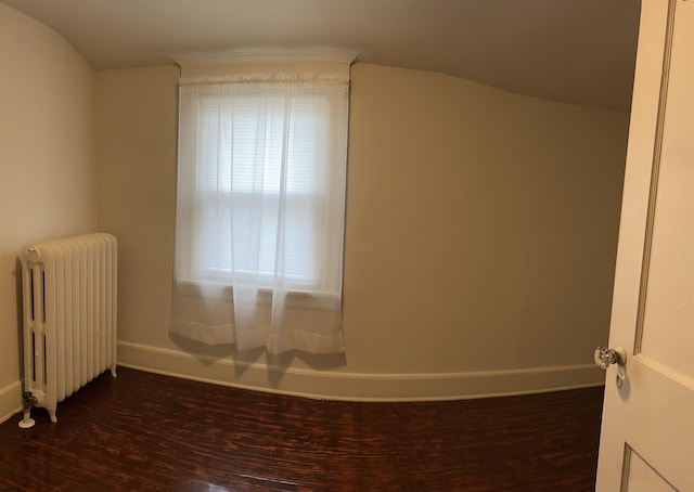 215 N Dorset, Ventnor Heights, NJ 08406 - spare room with radiator heating unit and dark wood finished floors