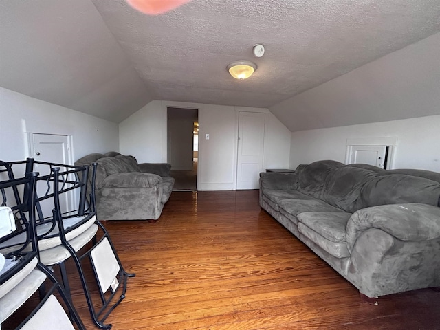 215 N Dorset, Ventnor Heights, NJ 08406 - living room with wood finished floors, vaulted ceiling, and a textured ceiling