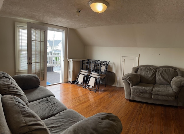 215 N Dorset, Ventnor Heights, NJ 08406 - living room featuring wood-type flooring, a textured ceiling, and vaulted ceiling