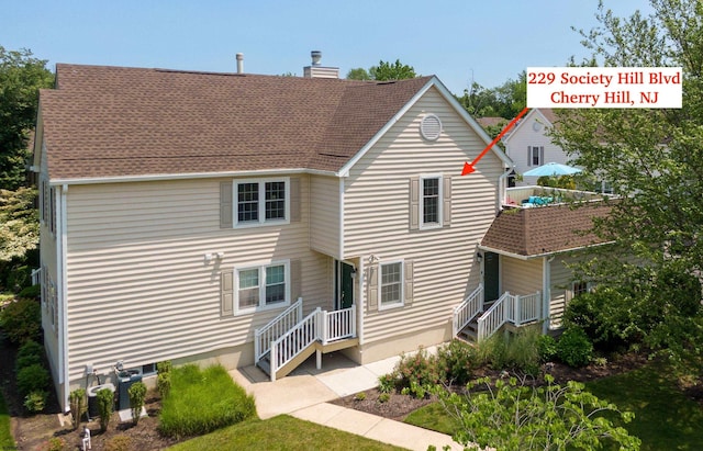 229 Society Hill Blvd Unit 229, Cherry Hill, NJ 08003 - rear view of property with a chimney