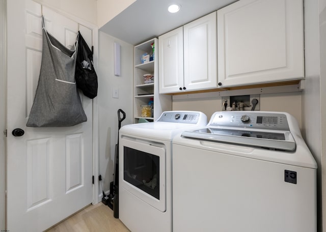 229 Society Hill Blvd Unit 229, Cherry Hill, NJ 08003 - washroom with separate washer and dryer, cabinet space, and light wood-style flooring