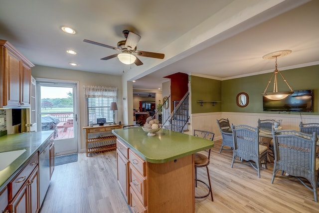 1081 Rte 50, Petersburg, NJ 08270 - kitchen with a wainscoted wall, a ceiling fan, a breakfast bar, light wood-style floors, and dishwashing machine