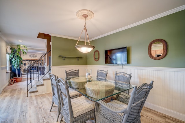 1081 Rte 50, Petersburg, NJ 08270 - dining space with stairs, a wainscoted wall, wood finished floors, and crown molding