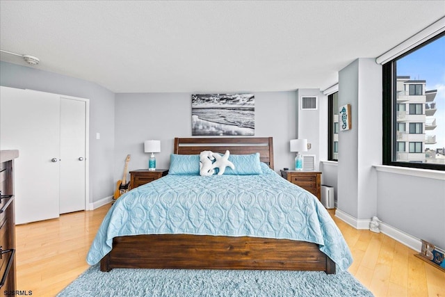 111 S 16th Ave Unit 415, Longport, NJ 08403 - bedroom with light wood-style flooring and baseboards