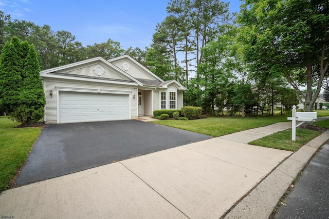 11 Brampton St, Galloway Township, NJ 08205 - view of front of home with asphalt driveway, a garage, and a front lawn