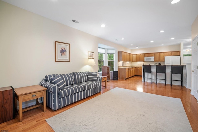 11 Brampton St, Galloway Township, NJ 08205 - living area featuring light wood finished floors and recessed lighting