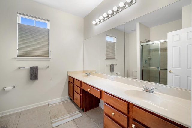 11 Brampton St, Galloway Township, NJ 08205 - full bathroom featuring double vanity, healthy amount of natural light, a stall shower, and tile patterned floors