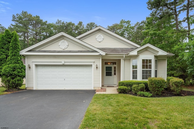 11 Brampton St, Galloway Township, NJ 08205 - ranch-style home featuring asphalt driveway, a front lawn, and a garage