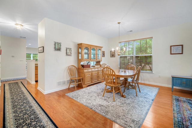 11 Brampton St, Galloway Township, NJ 08205 - dining area featuring light wood-type flooring and a chandelier