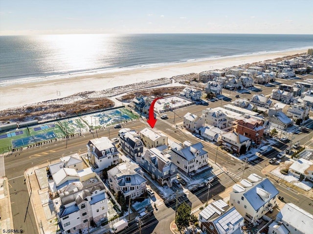 3301 Atlantic Ave, Longport, NJ 08403 - drone / aerial view of waterfront with a beach