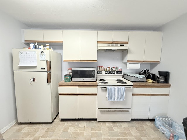 78 Pheasant Meadow Dr Unit 67, Galloway Township, NJ 08205 - kitchen featuring white appliances, under cabinet range hood, light countertops, and white cabinetry