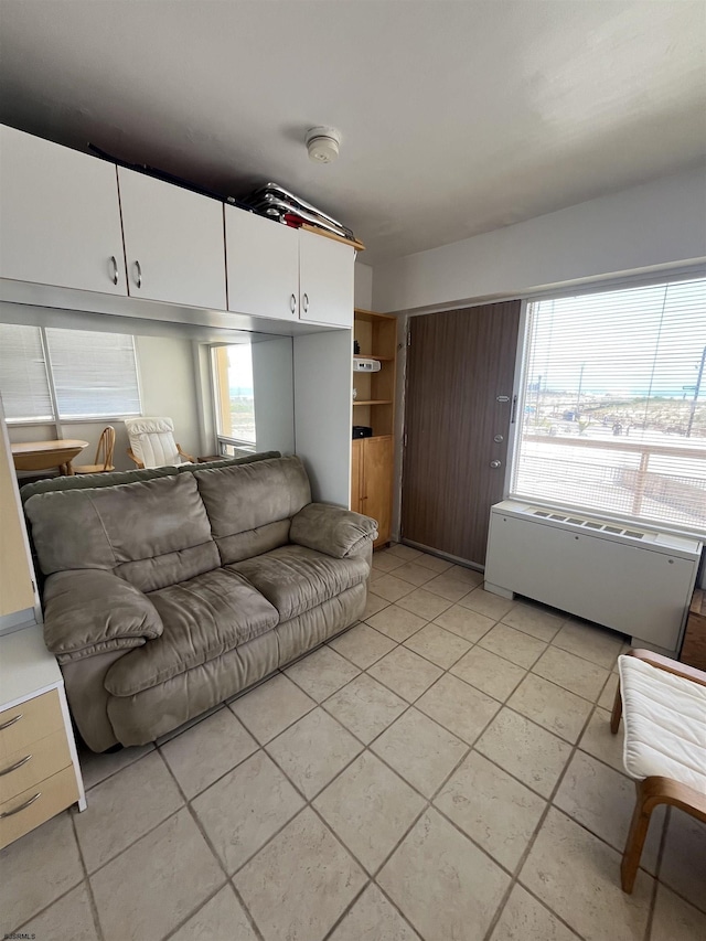 108 S Montpelier Ave Unit 206, Atlantic City, NJ 08401 - living area with light tile patterned flooring, plenty of natural light, and radiator