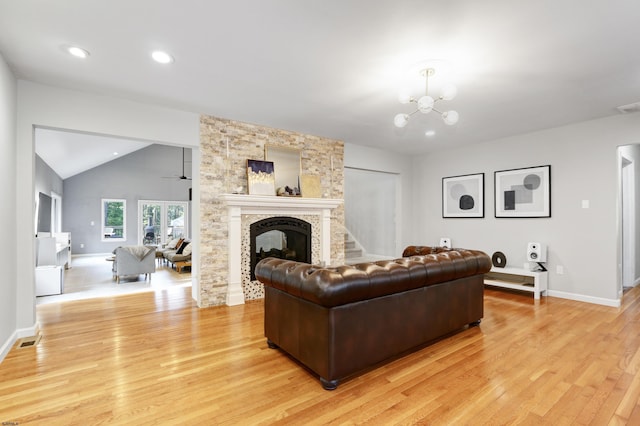 106 Hillside Ave, Absecon, NJ 08201 - living area featuring light wood-type flooring, a fireplace, a chandelier, lofted ceiling, and recessed lighting