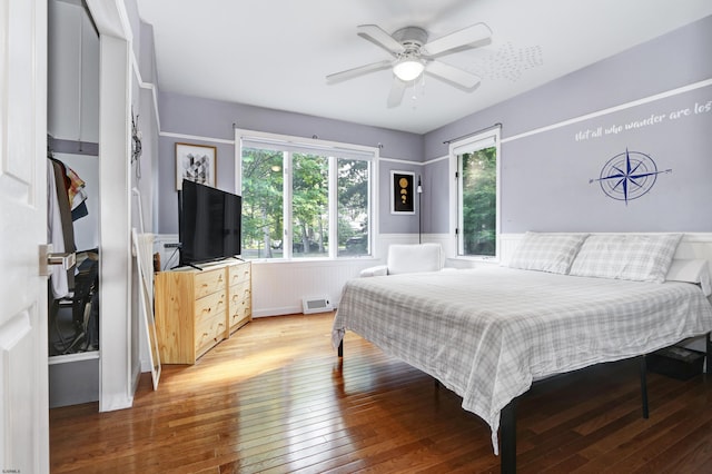 106 Hillside Ave, Absecon, NJ 08201 - bedroom with light wood-style floors, wainscoting, and a ceiling fan